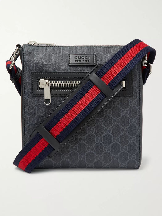 GUCCI LEATHER-TRIMMED MONOGRAMMED COATED-CANVAS MESSENGER BAG